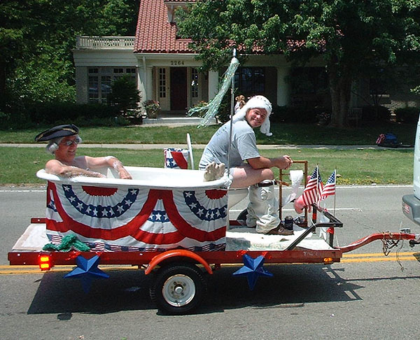 the parade- the guy on the 'pot' was tossing out Tootsie Rolls.jpg 128.8K